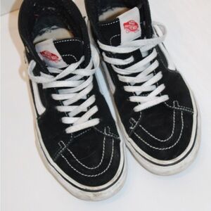 Vans Black and White High-Top Sneakers